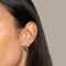 Charm Crystal Huggies in Silver worn with other earrings